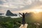 Happy woman enjoy Phang Nga bay view at sunrise