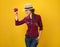 Happy woman grower isolated on yellow posing with an apple