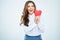 Happy woman hold red heart. Long curly hair. Beautiful female m