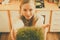 Happy woman holding cuckooflower cress