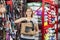 Happy Woman Holding Pet Carrier In Store