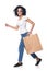 Happy woman holding shopping bag with empty copy space running