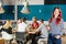 Happy Woman Holding Wineglass At Restaurant