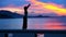 Happy Woman Jumping in Sea Sunset on Samui island,