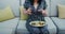 a happy woman photographs beautiful food in a restaurant, she is filled with joy.