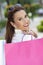 Happy Woman With Pink and White Shopping Bags