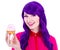 Happy woman with purple hair holding cupcake with pink cream iso