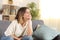 Happy woman relaxing meditating at home