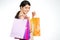 Happy woman shopper with colorful bags