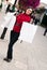 Happy woman shopping with white bags