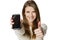 Happy woman showing her mobile phone and gesturing thumb up