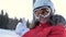 Happy Woman Skier Climbs The Ski Lift And Shows Her Thumb Up