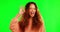 Happy woman, smile and okay sign or emoji on green screen for good service against a studio background. Portrait of