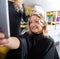 Happy Woman Talking Selfie In Beauty Salon