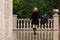 Happy woman with umbrella in the rain