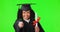 Happy woman, university student pointing and graduation on green screen, African girl with scholarship for education