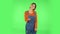 Happy woman waving hand and showing gesture come here. Green screen