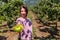 Happy woman in You pick apple orchard