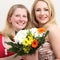 Happy women with a colourful bouquet