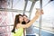 Happy women girlfriends taking a selfie in ferris wheel