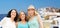 Happy women over santorini island background