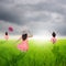 Happy Women in rice fields and rainclouds