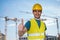 Happy worker in construction site is showing thumbs up gesture