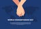 Happy world humanitarian international day banner poster with earth map and hand hold hand on blue background