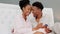 Happy, wow and couple with pregnant woman, pregnancy test and smile in bedroom at home. Black woman and man hold