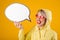 Happy yellow raincoat woman. Emotions and yellow background