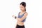 Happy young asian woman looking smartwatch for exercise and aerobics with cardio  on white background.