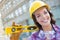 Happy Young Attractive Female Construction Worker Wearing Hard Hat and