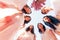 Happy young bridesmaids looking down together, bottom view