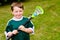 Happy young child lacrosse player