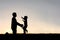 Happy Young Child Running to Greet Dad Silhouette