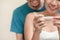 Happy young couple asian woman and man smiling and holding pregnancy test, Wellness and healthy concept, Abortion problem,