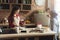 Happy young couple baking in loft kitchen