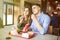 Happy young couple fries during lunchtime in a cafe