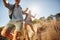 Happy young couple having fun on their hiking trip