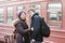 Happy young couple on railway station platform