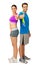 Happy Young Couple In Sports Wear Gesturing Thumbs Up