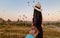 happy young couple during sunrise watching the hot air balloons of Kapadokya Cappadocia Turkey