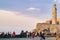 Happy young family dancing in evening sun on Malecon, Havana