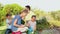 Happy young family gardening together