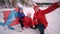 Happy, young family walks, takes photos in the canyon. Winter landscape