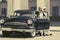 Happy young fashion couple in love outside a vintage car