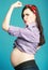 Happy young funny pregnant woman