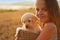 Happy young girl with her adorable labrador puppy dog