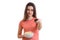 Happy young girl switches remote control and holding a plate with pop-corn