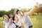 Happy young group taking selfie in the park